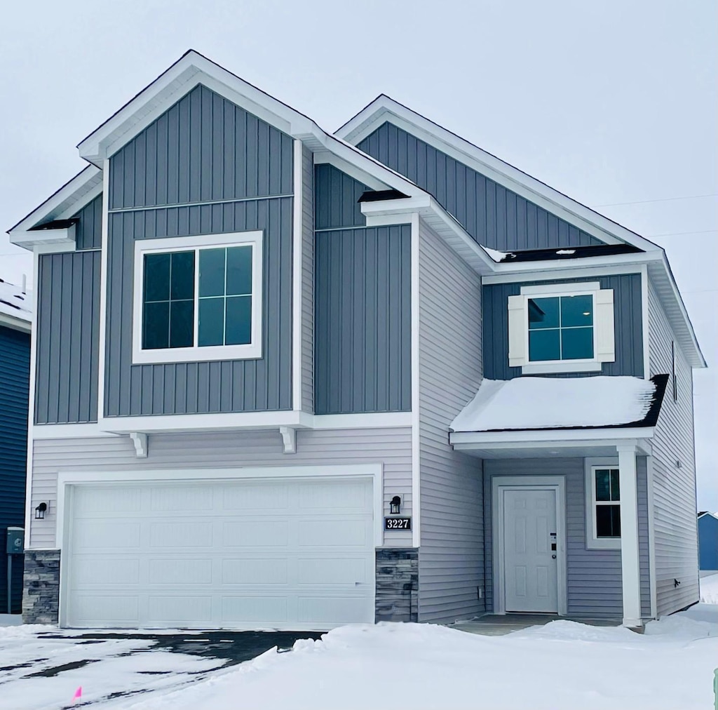 view of front of home with a garage