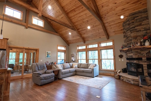 living room featuring hardwood / wood-style floors, wooden ceiling, and beam ceiling