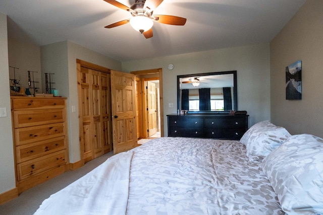 bedroom featuring ceiling fan and carpet flooring