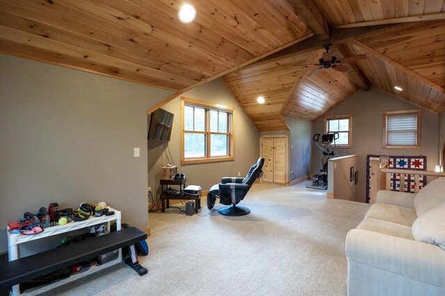 exercise area featuring vaulted ceiling, carpet floors, ceiling fan, and wood ceiling