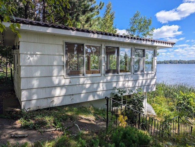 view of side of property featuring a water view