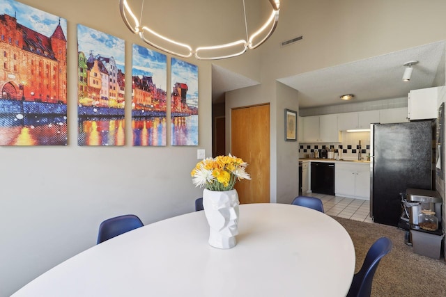 dining space with light tile patterned floors