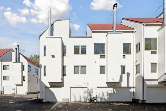 view of building exterior featuring a garage