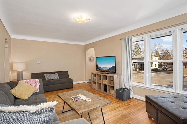 living room with light hardwood / wood-style flooring