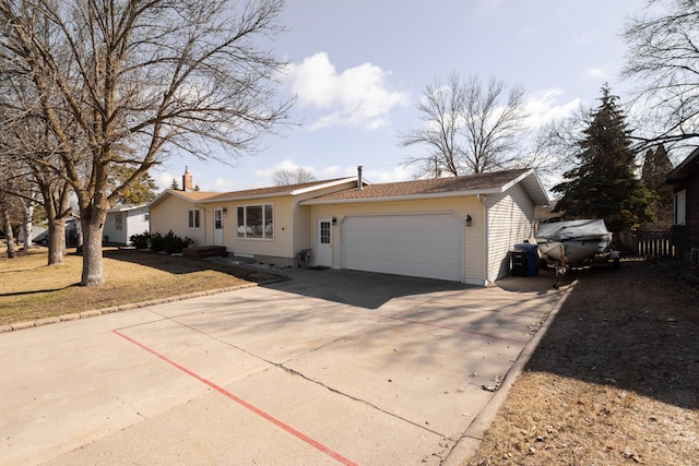 ranch-style home with a garage