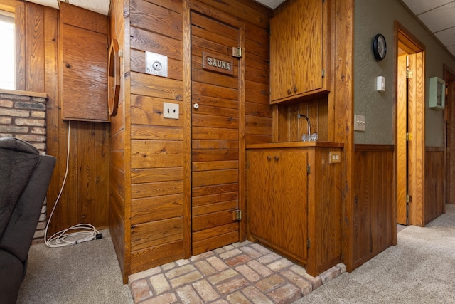 kitchen with wood walls