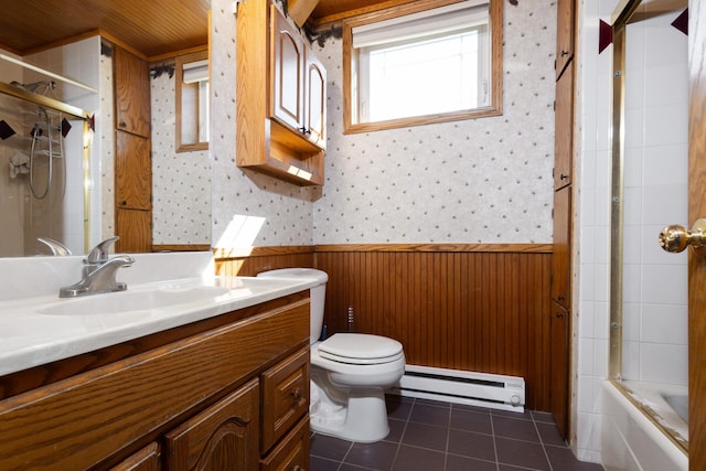 full bathroom featuring tile patterned floors, toilet, combined bath / shower with glass door, vanity, and a baseboard heating unit