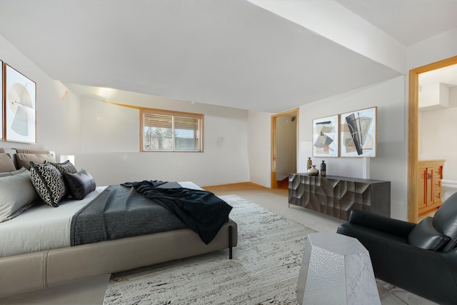 bedroom featuring light colored carpet