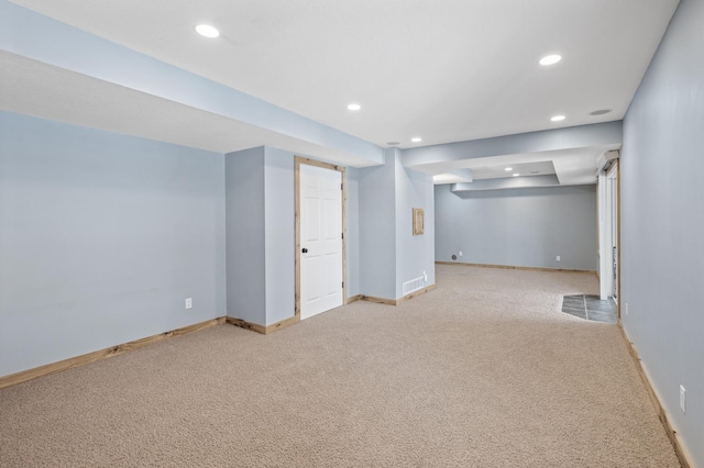 basement with light carpet