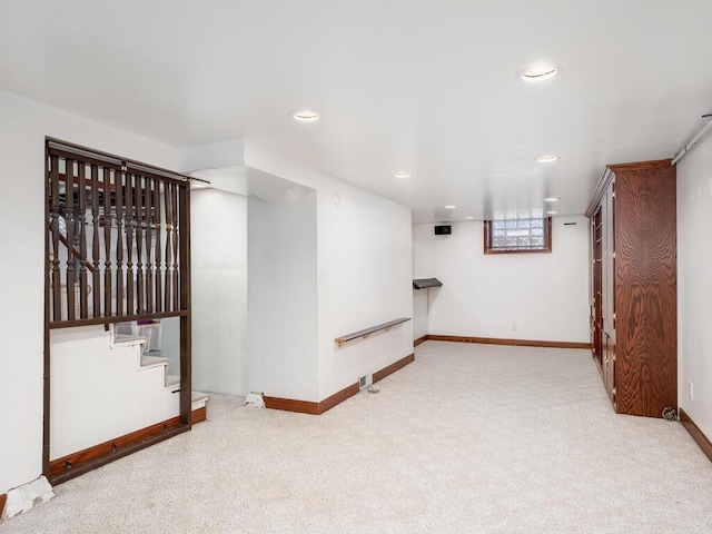 basement with light carpet