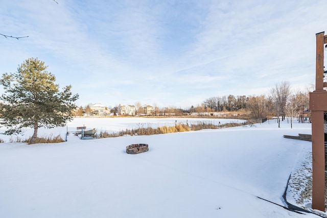 view of yard covered in snow