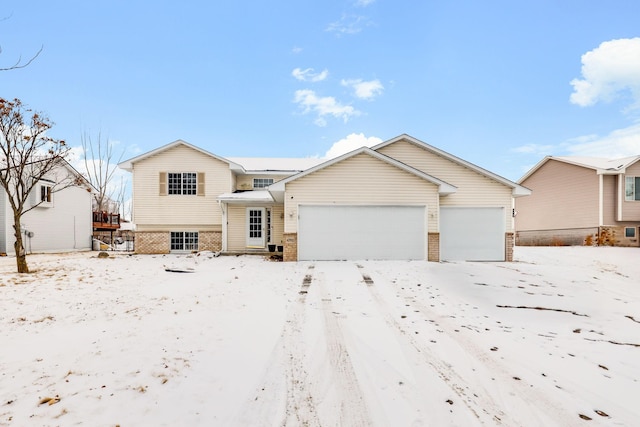 split level home featuring a garage