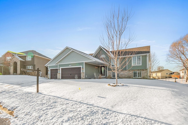 view of front of property with a garage