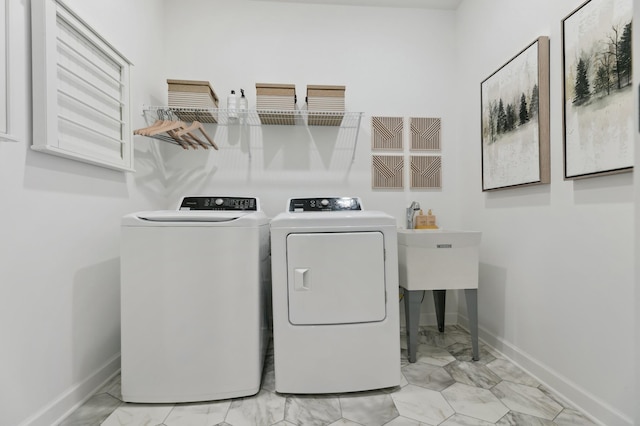 laundry room with washer and clothes dryer