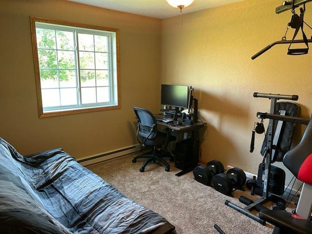 office space featuring carpet floors and baseboard heating