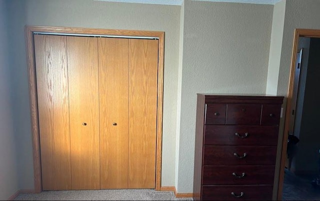 unfurnished bedroom with a closet