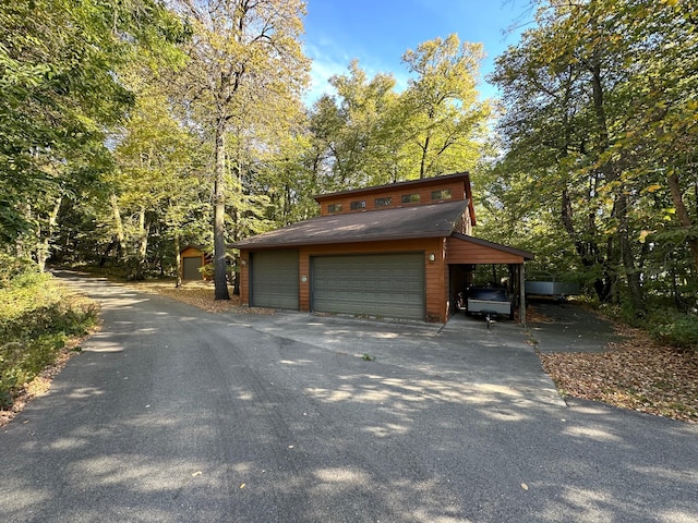 exterior space with a garage