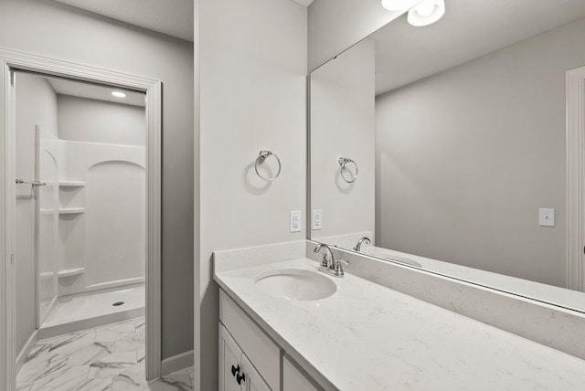 bathroom featuring vanity and walk in shower