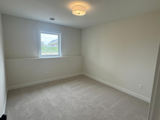 14514 Kingsview Ln, Dayton, MN 55327 - empty room featuring baseboards and light carpet