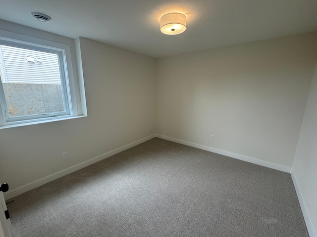 14514 Kingsview Ln, Dayton, MN 55327 - carpeted spare room with baseboards and visible vents