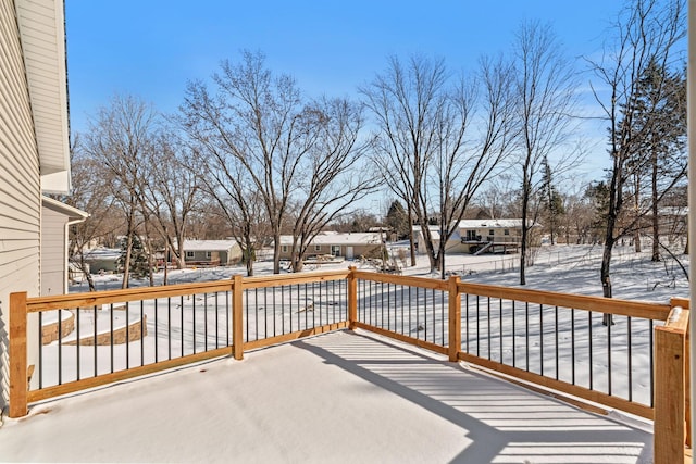 view of snow covered deck