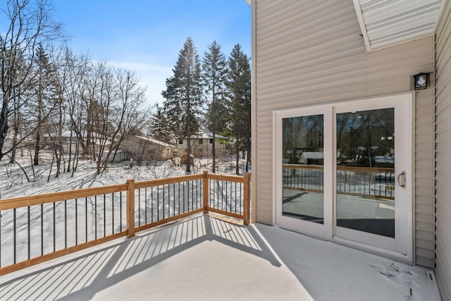 view of snow covered deck