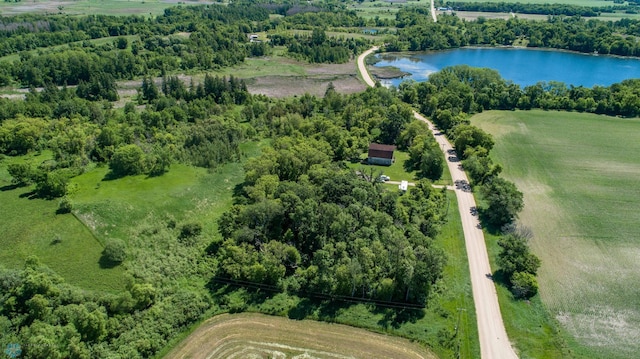 drone / aerial view with a water view and a rural view