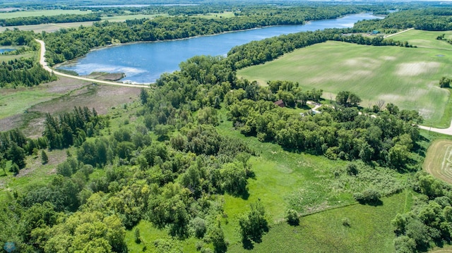 birds eye view of property featuring a water view and a rural view