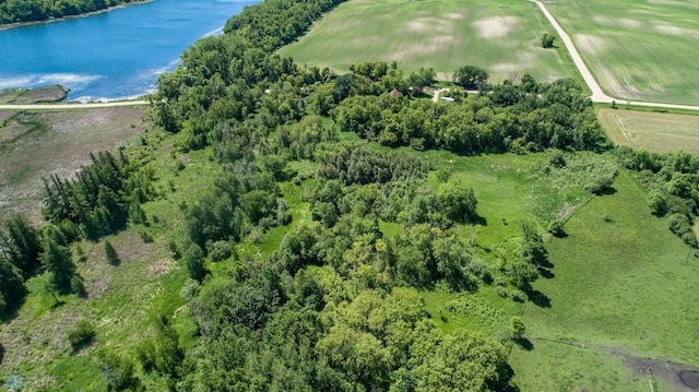 aerial view with a rural view and a water view