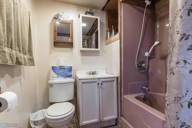 full bathroom with shower / tub combo with curtain, vanity, and toilet