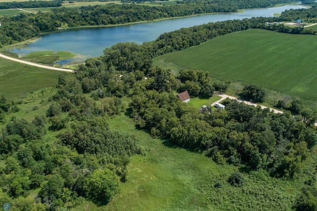 drone / aerial view featuring a water view and a rural view