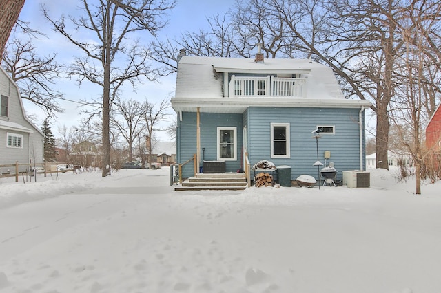 view of front of property with central AC unit