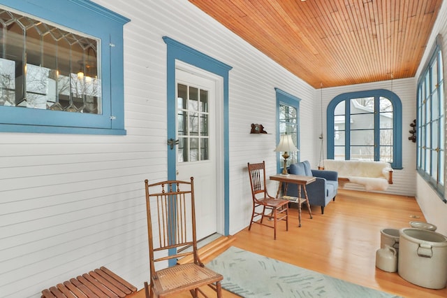 sunroom / solarium with wood ceiling