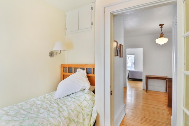 bedroom featuring light wood-type flooring