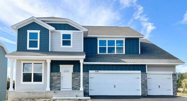 view of front of home with a garage