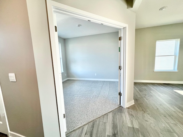 unfurnished room featuring light hardwood / wood-style floors