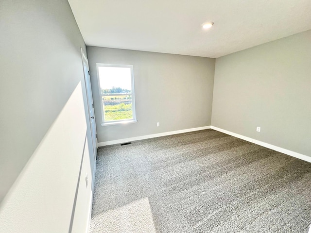 view of carpeted spare room