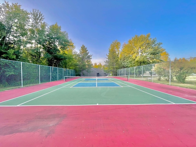 view of tennis court with basketball court