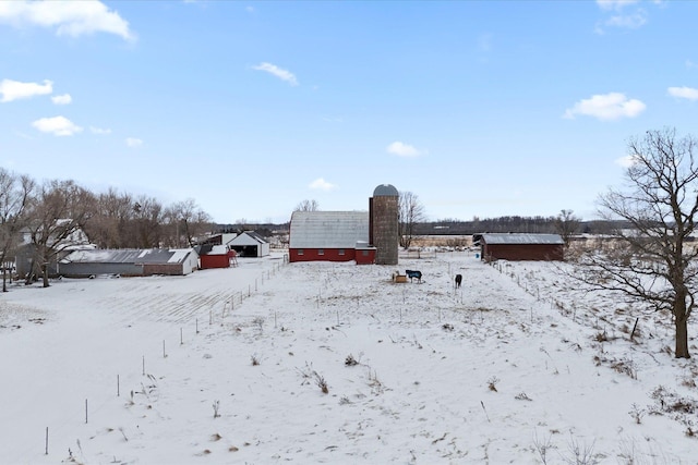 view of yard layered in snow