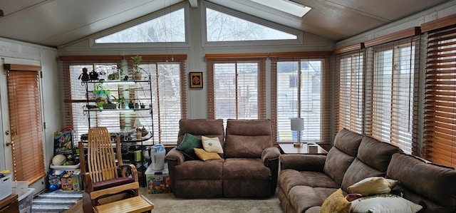 carpeted living room with vaulted ceiling