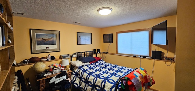 bedroom with a textured ceiling