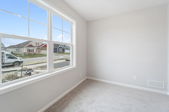 spare room with carpet flooring