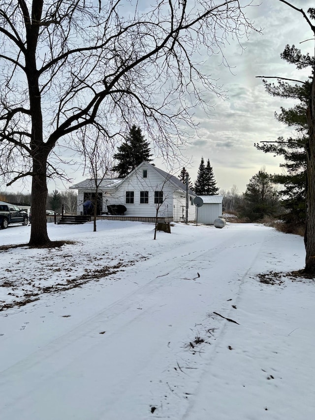 view of yard covered in snow