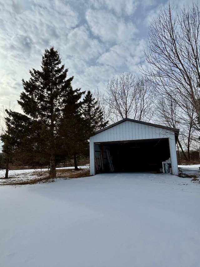 view of snow covered garage