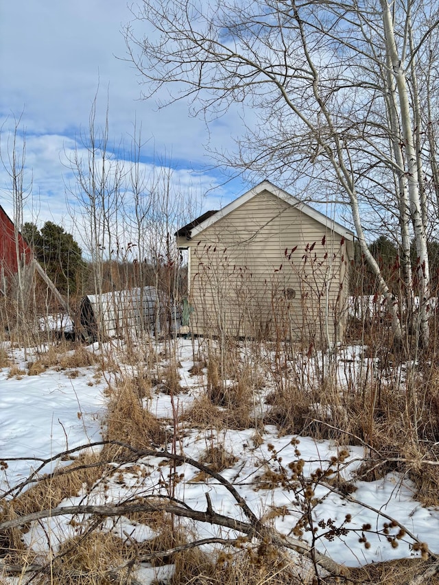 view of yard covered in snow