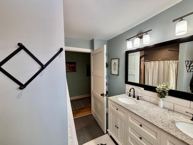 bathroom featuring tasteful backsplash, vanity, and a shower with curtain