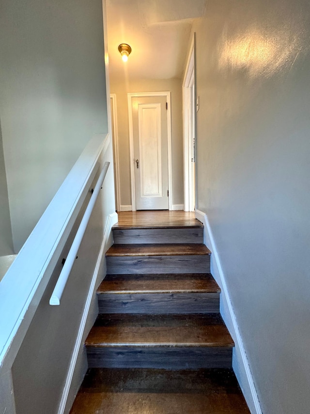 stairway with baseboards