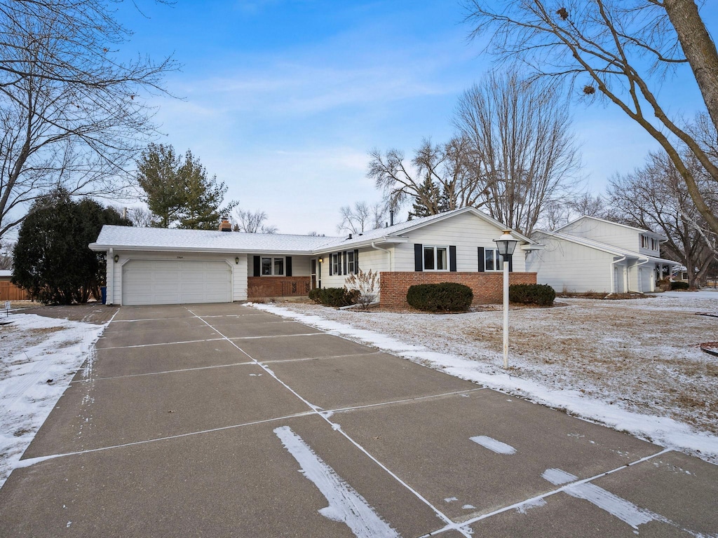 ranch-style home with a garage