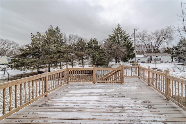 view of snow covered deck