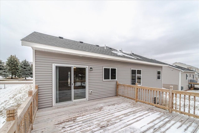 view of snow covered deck